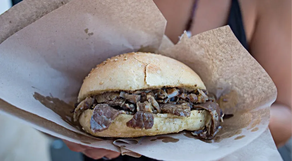 Pani ca meusa, the Palermo spleen sandwich, topped with cheese