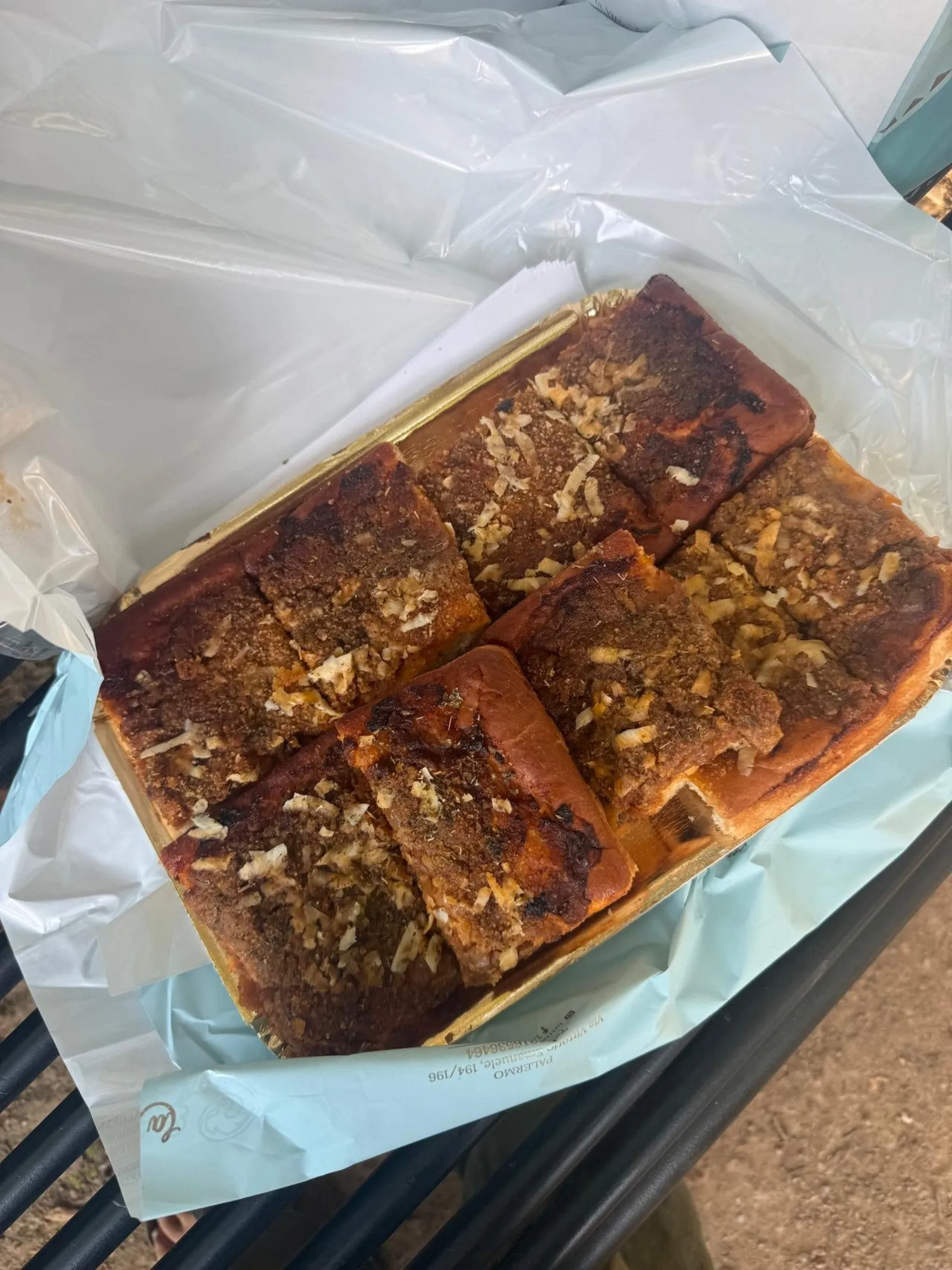 A tray of sfincione bought on the walk