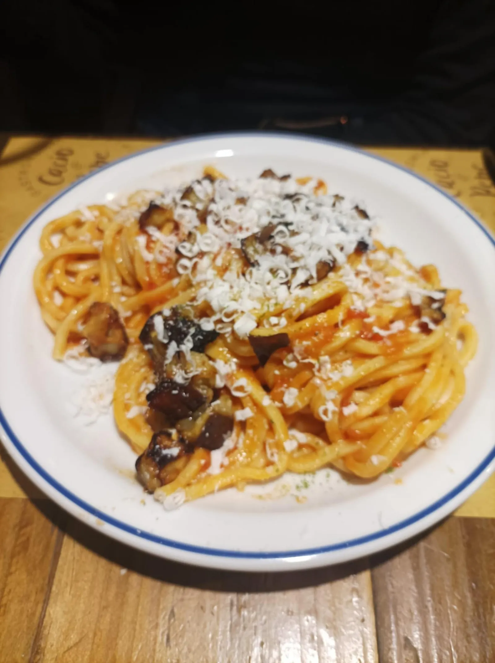 A plate of pasta alla Norma with aubergine and ricotta salata