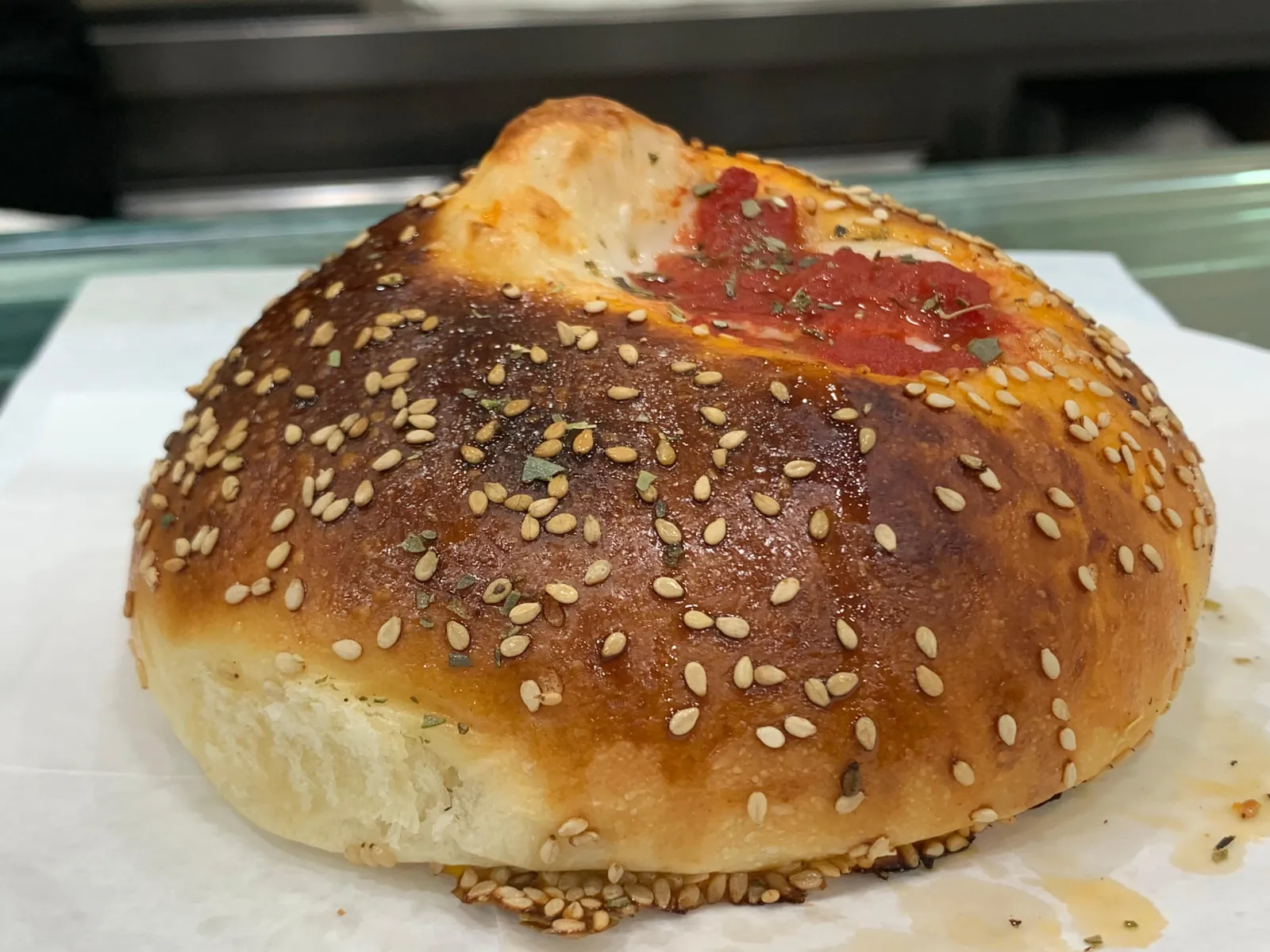 A sesame-topped stuffed bun from a Palermo bakery