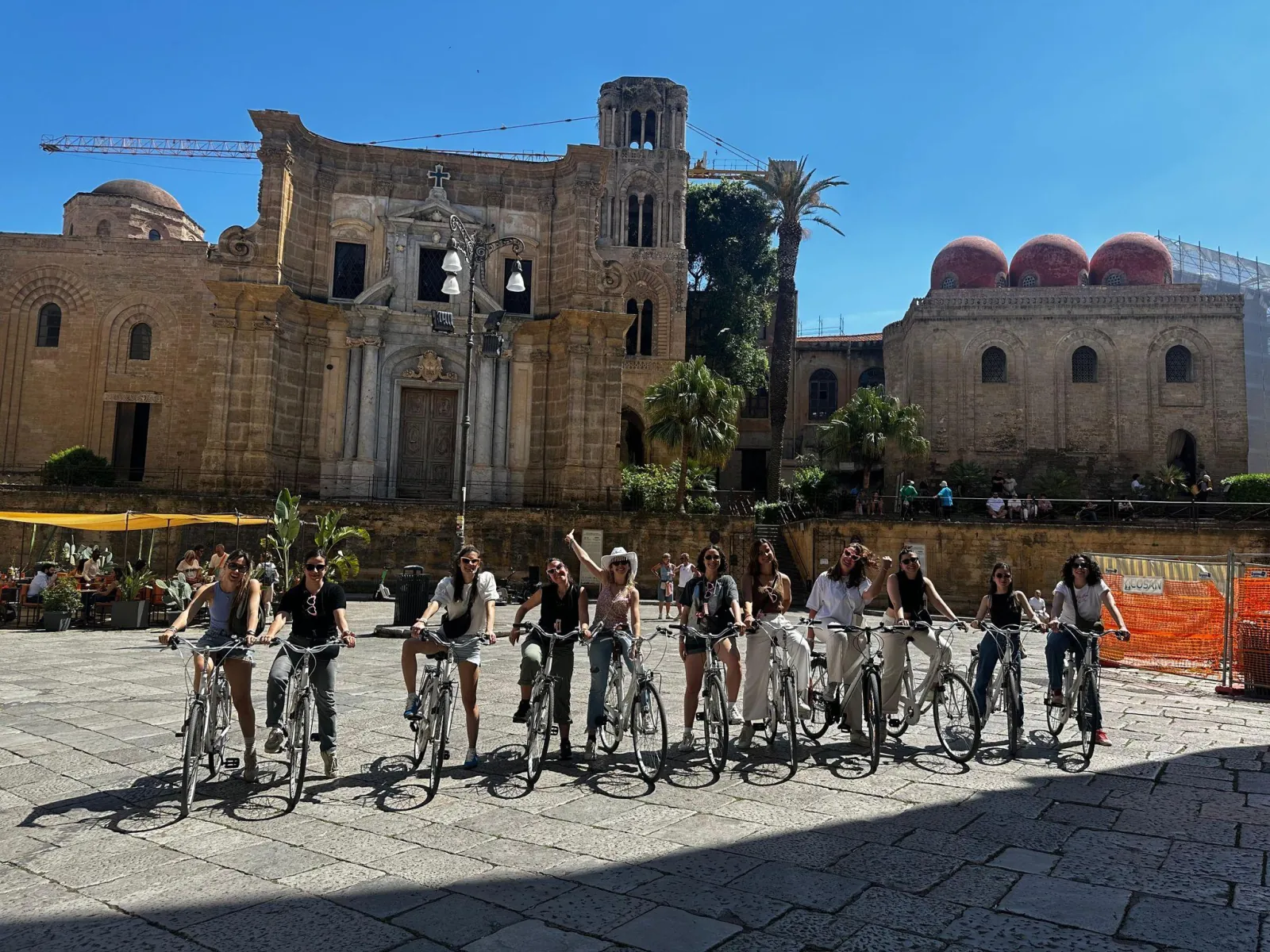 Cyclists lined up below the Martorana and San Cataldo