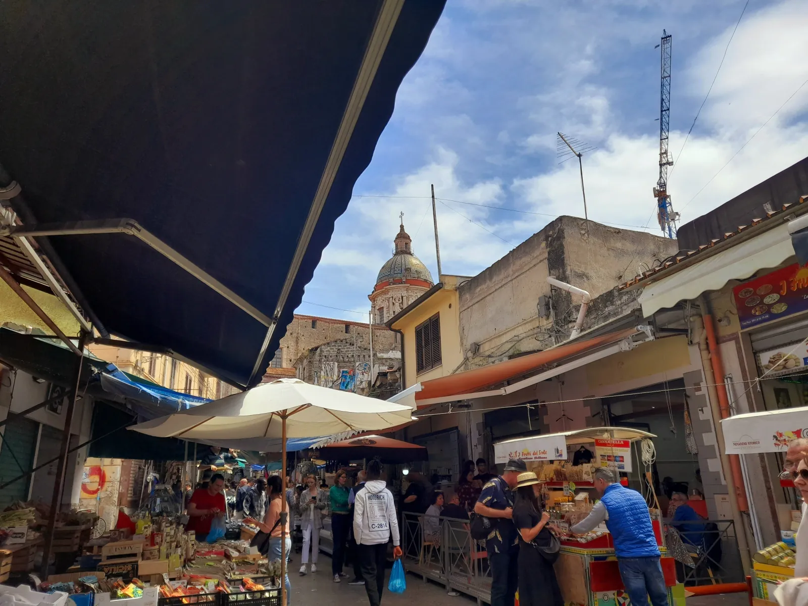 Stalls and awnings along the Ballarò market