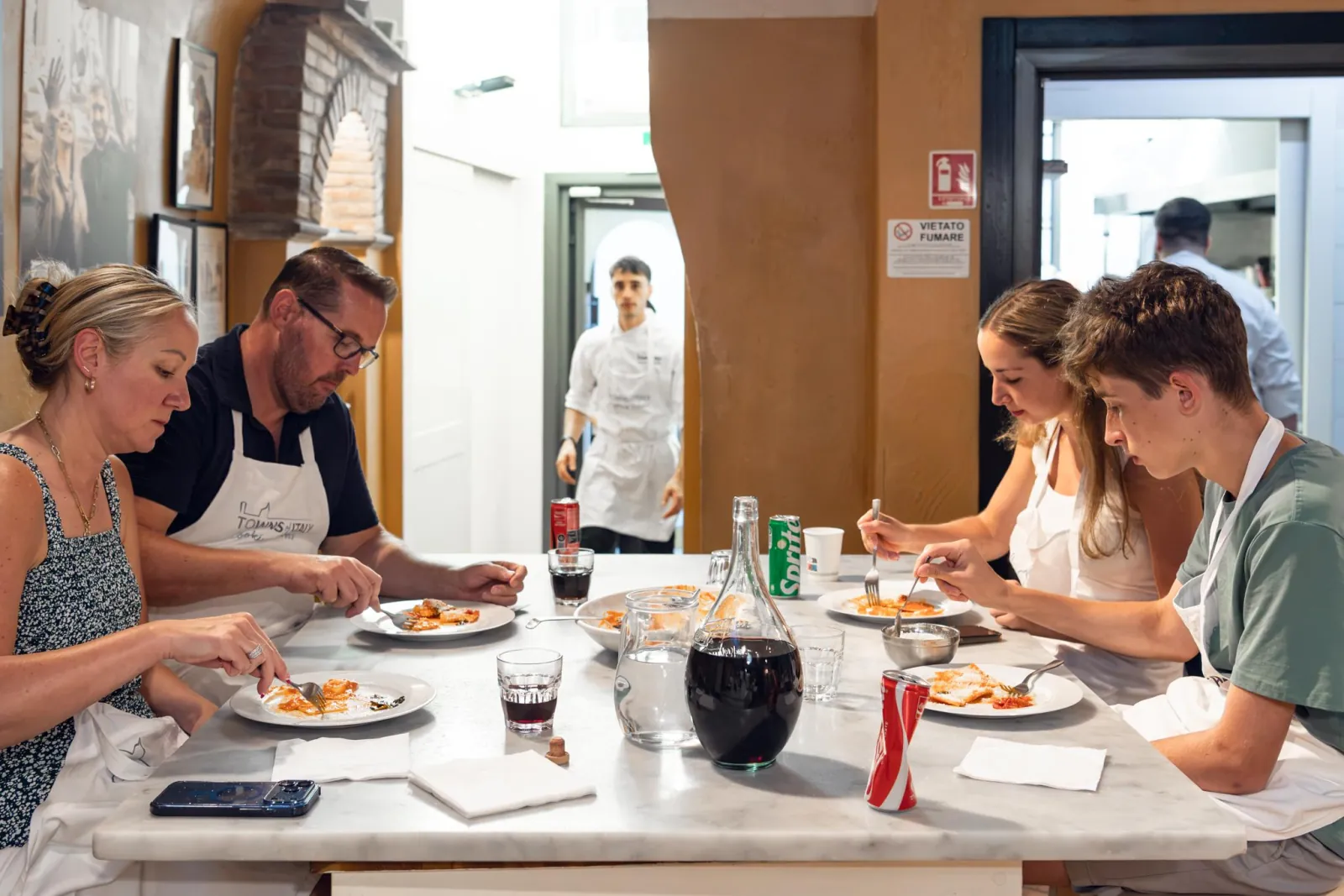 Guests eating the dishes they cooked